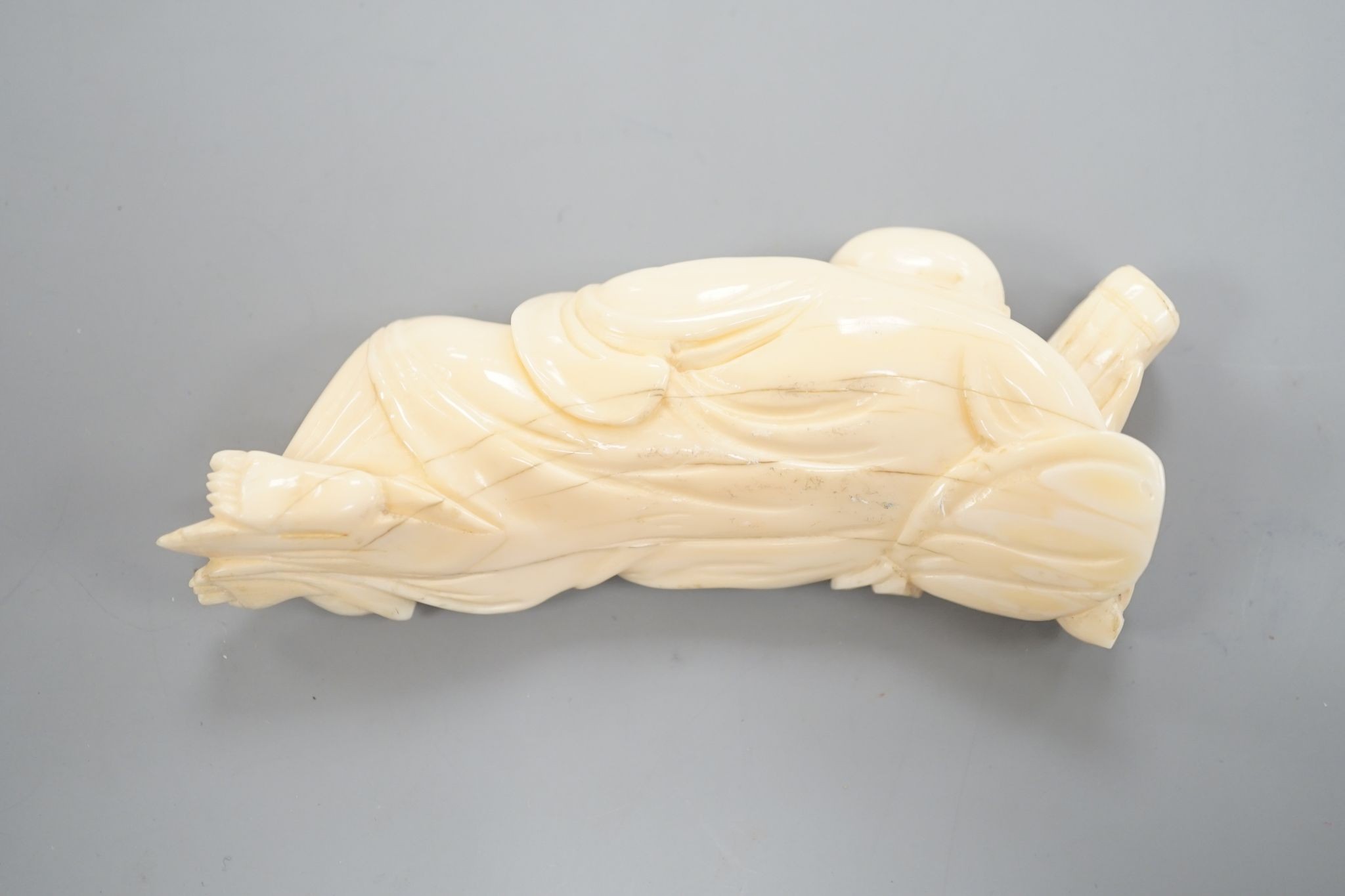 A 19th century Chinese carved ivory figure of Budai 11cm